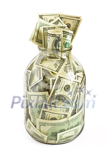 Glass jar full of hundreds of dollars isolated on white background Glass jar full of hundreds of dollars isolated on white background
