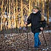 Senior man nordic walking, enjoying the outdoors, the fresh air, getting the necessary exercise