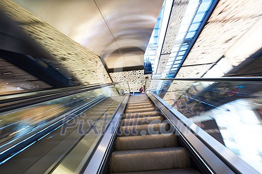 Shopping mall center escalators. Zoom blur movement. Shopping mall center escalators. Zoom blur movement.