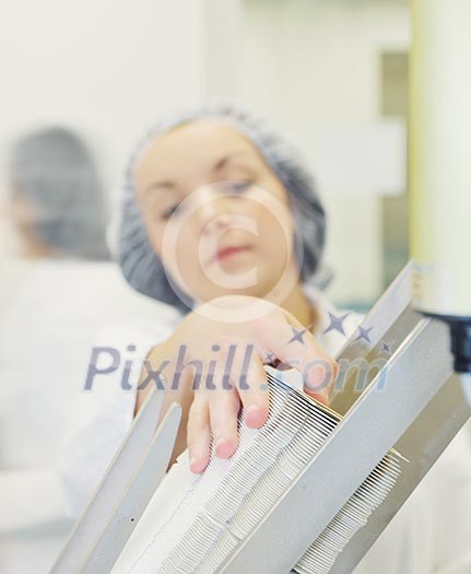 woman worker in pharmacy company warehouse woman worker in pharmacy company warehouse