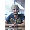 Portrait of an handsome young  man  with urban background and fashion clothes style