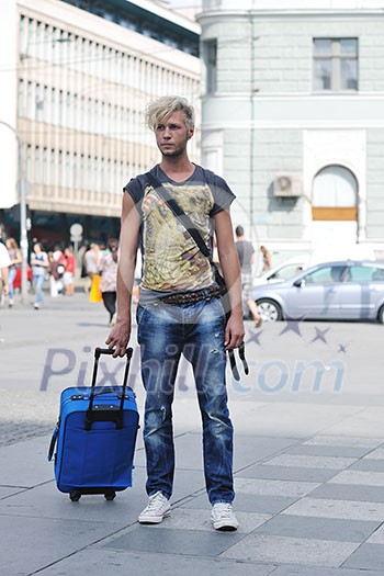 Portrait of an handsome young man with urban background and fashion clothes style Portrait of an handsome young man with urban background and fashion clothes style