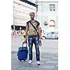 Portrait of an handsome young  man  with urban background and fashion clothes style