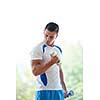 young man in fintess sport club exercise with weights and relaxing