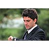 one young businessman face portrait outdoor
