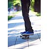 urban scene, closeup of skateboard jump