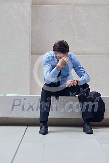 frustrated young business man working on laptop computer at office frustrated young business man working on laptop computer at office