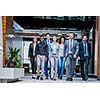 young multi ethnic business people group walking standing and top view