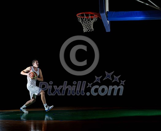 basketball game sport player in action isolated on black background basketball game sport player in action isolated on black background