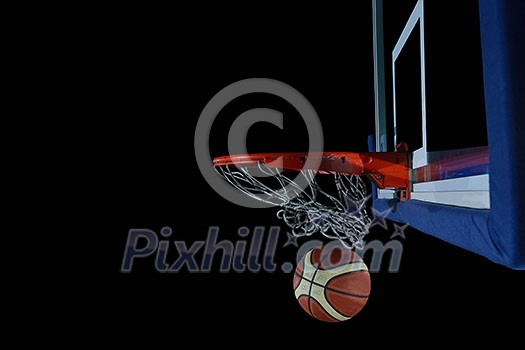 Basketball ball, board and net on black background in gym indoor Basketball ball, board and net on black background in gym indoor