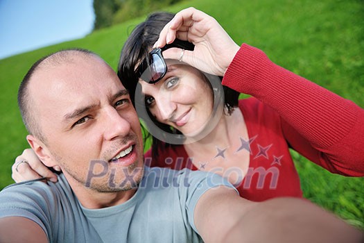 young happy couple have fun outdoor in nature young happy couple have fun outdoor in nature