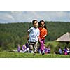 happy kids group have fun in nature outdoors park