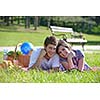 happy young romantic couple in love   having a picnic outdoor on a summer day