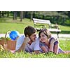 happy young romantic couple in love   having a picnic outdoor on a summer day