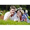 happy young romantic couple in love   having a picnic outdoor on a summer day