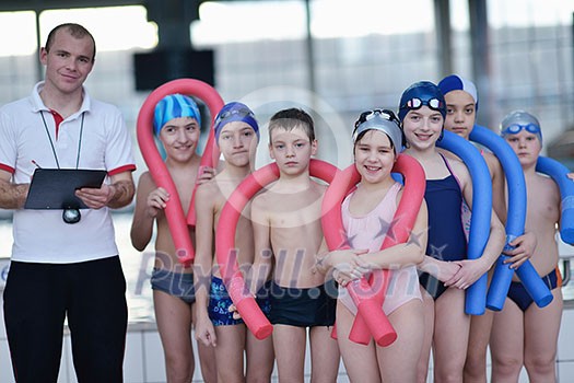 happy children kids group at swimming pool class learning to swim happy children kids group at swimming pool class learning to swim