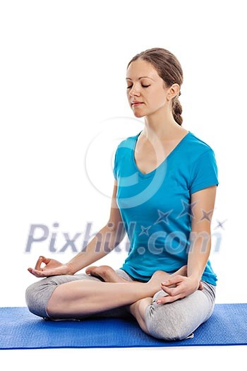 Yoga - young beautiful woman yoga instructor doing Lotus Position (padmasana with chin mudra) asana exercise - cross-legged sitting asana for meditation - isolated on white background Yoga - young beautiful woman yoga instructor doing Lotus Position (padmasana with chin mudra) asana exercise - cross-legged sitting asana for meditation - isolated on white background