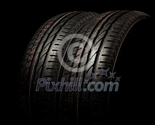 Two new car tires close up Two new car tires close up