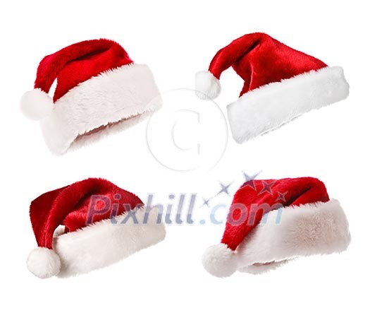 Set Santa Claus red hats isolated on white Set Santa Claus red hats isolated on white