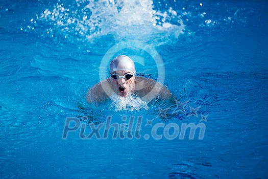 swimmer excercise on indoor swimming pool, sport and health concept swimmer excercise on indoor swimming pool, sport and health concept