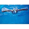 swimmer excercise on indoor swimming pool, sport and health concept