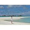 happy young woman on summer vacation on beautiful tropical beach have fun enjoy and relax