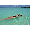 happy young woman on summer vacation on beautiful tropical beach have fun enjoy and relax