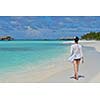 happy young woman on summer vacation on beautiful tropical beach have fun and relax