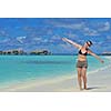 happy young woman on summer vacation on beautiful tropical beach have fun and relax