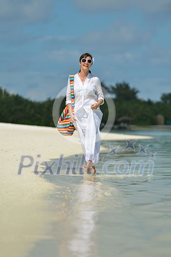 happy young woman on summer vacation on beautiful tropical beach have fun enjoy and relax happy young woman on summer vacation on beautiful tropical beach have fun enjoy and relax