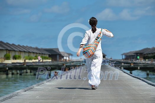happy young woman on summer vacation on beautiful tropical beach have fun enjoy and relax happy young woman on summer vacation on beautiful tropical beach have fun enjoy and relax