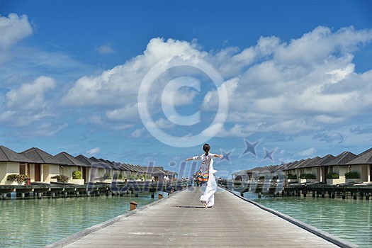happy young woman on summer vacation on beautiful tropical beach have fun enjoy and relax happy young woman on summer vacation on beautiful tropical beach have fun enjoy and relax