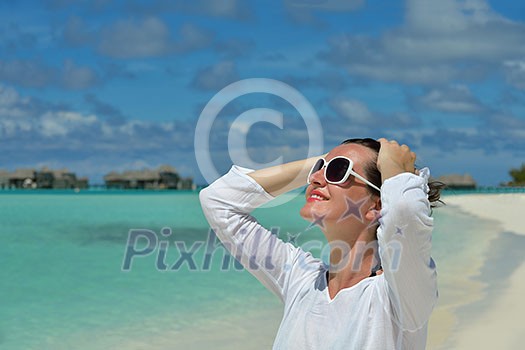 happy young woman on summer vacation on beautiful tropical beach have fun enjoy and relax happy young woman on summer vacation on beautiful tropical beach have fun enjoy and relax