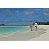 happy young romantic couple in love have fun running and relaxing on beautiful beach