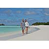 happy young  couple at summer vacation have fun and relax at beautiful sunny  day on beach