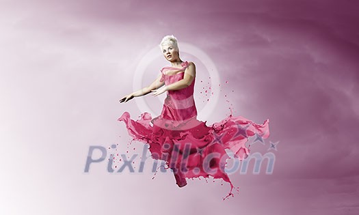 Young attractive woman in pink dress jumping high Young attractive woman in pink dress jumping high
