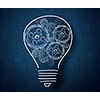 Conceptual image of light bulb and business strategy sketch