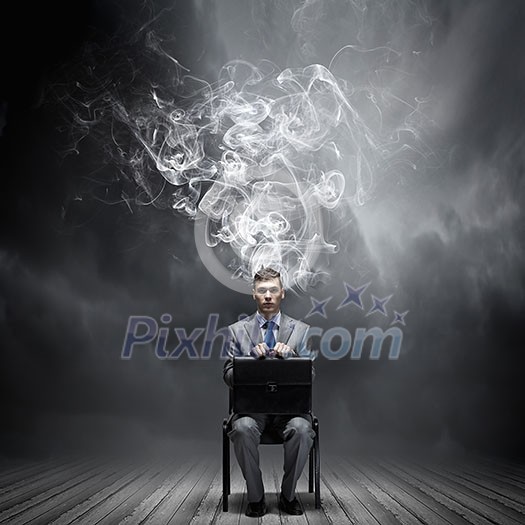 Young businessman thinking over the ideas. Creativity concept Young businessman thinking over the ideas. Creativity concept