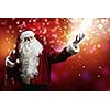 Santa Clause with gift bag behind shoulders