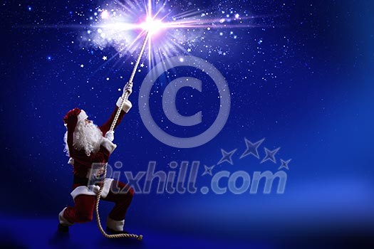 Santa Clause in red costume against blue background Santa Clause in red costume against blue background