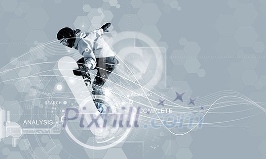 Male snowboarder making jump against media background Male snowboarder making jump against media background