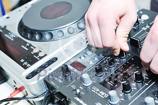 dj equipment gramophone and mixete with dj hand on party event dj equipment gramophone and mixete with dj hand on party event