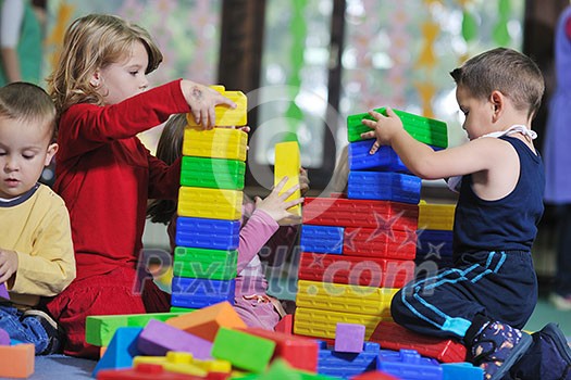 happy child kids group have fun and play at kindergarden indoor preschool education concept with teacher happy child kids group have fun and play at kindergarden indoor preschool education concept with teacher