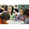 happy child kids group have fun and play at kindergarden indoor preschool education concept with  teacher