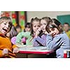happy child kids group have fun and play at kindergarden indoor preschool education concept with  teacher