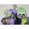 happy child kids group have fun and play at kindergarden indoor preschool education concept with  teacher