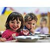 happy child kids group have fun and play at kindergarden indoor preschool education concept with  teacher