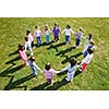 happy child kids group have fun and play at kindergarden outdoor preschool education concept with  teacher