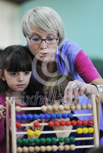 happy child kids group have fun and play at kindergarden indoor preschool education concept with teacher happy child kids group have fun and play at kindergarden indoor preschool education concept with teacher