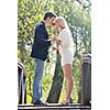 happy young romantic couple in love dance outdoor at spring season on early mornig with beautiful light